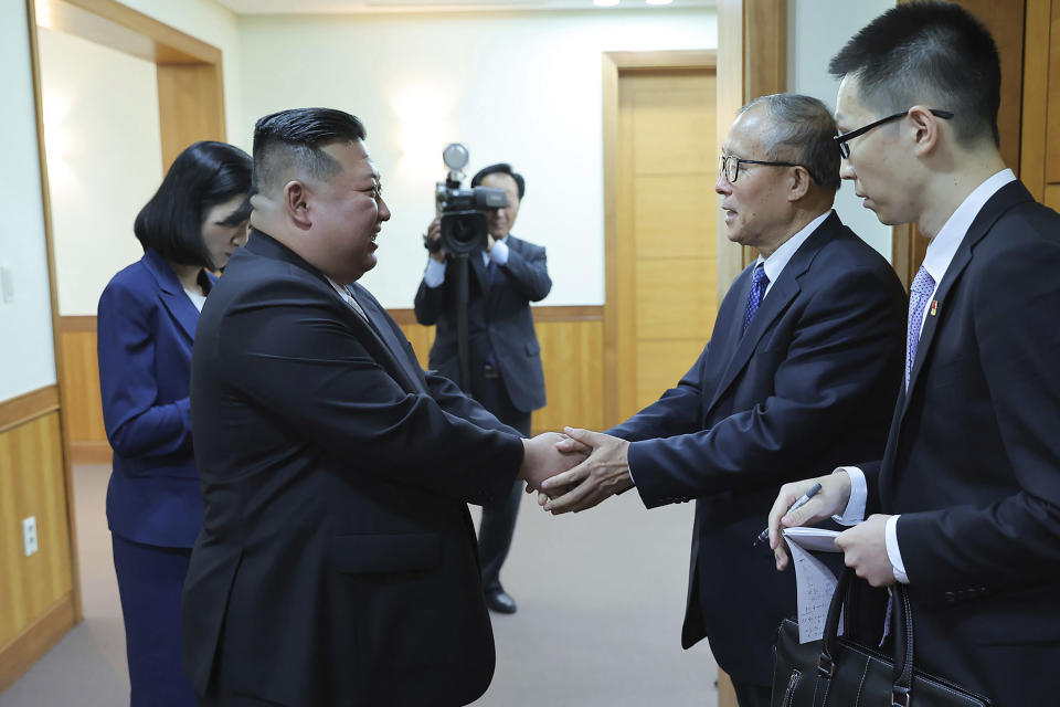 In this photo provided by the North Korean government, North Korean leader Kim Jong Un, left, shakes hands with China's Vice Chairman of the standing committee of the country’s National People’s Congress Li Hongzhong in Pyongyang, North Korea, Thursday, July 27, 2023. Independent journalists were not given access to cover the event depicted in this image distributed by the North Korean government. The content of this image is as provided and cannot be independently verified. Korean language watermark on image as provided by source reads: "KCNA" which is the abbreviation for Korean Central News Agency. (Korean Central News Agency/Korea News Service via AP)