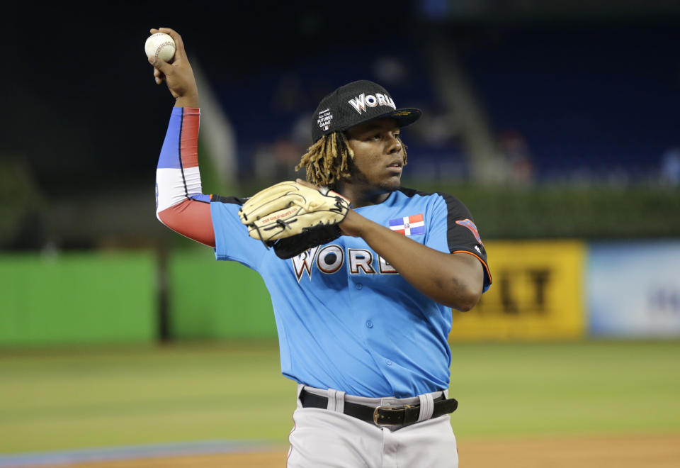 World Team designated hitter Vladimir Guerrero Jr., of the Toronto Blue Jays, warms up before the All-Star Futures baseball game, Sunday, July 9, 2017, in Miami. (AP)