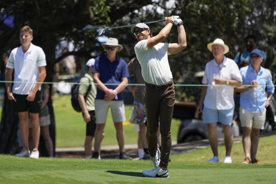 Patrick Rodgers of the United States watches his approach into the first green during the second round of the Australian Open Golf Championship in Sydney, Australia, Friday, Dec. 1, 2023. (AP Photo/Mark Baker)