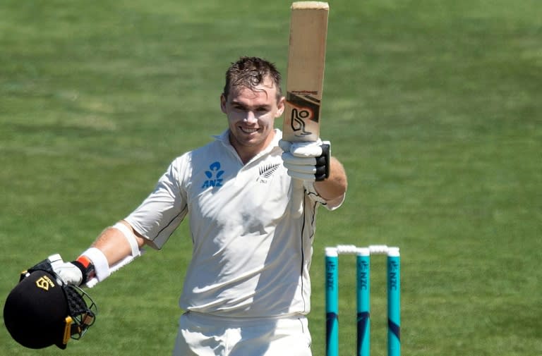 Tom Latham salutes the New Zealand team balcony after reaching 200