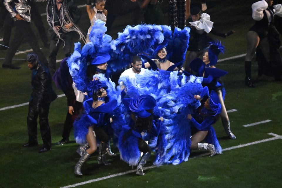 Usher performs during halftime of the NFL Super Bowl 58 football game between the San Francisco 49ers and the Kansas City Chiefs on Sunday, Feb. 11, 2024, in Las Vegas. (AP Photo/David Becker)