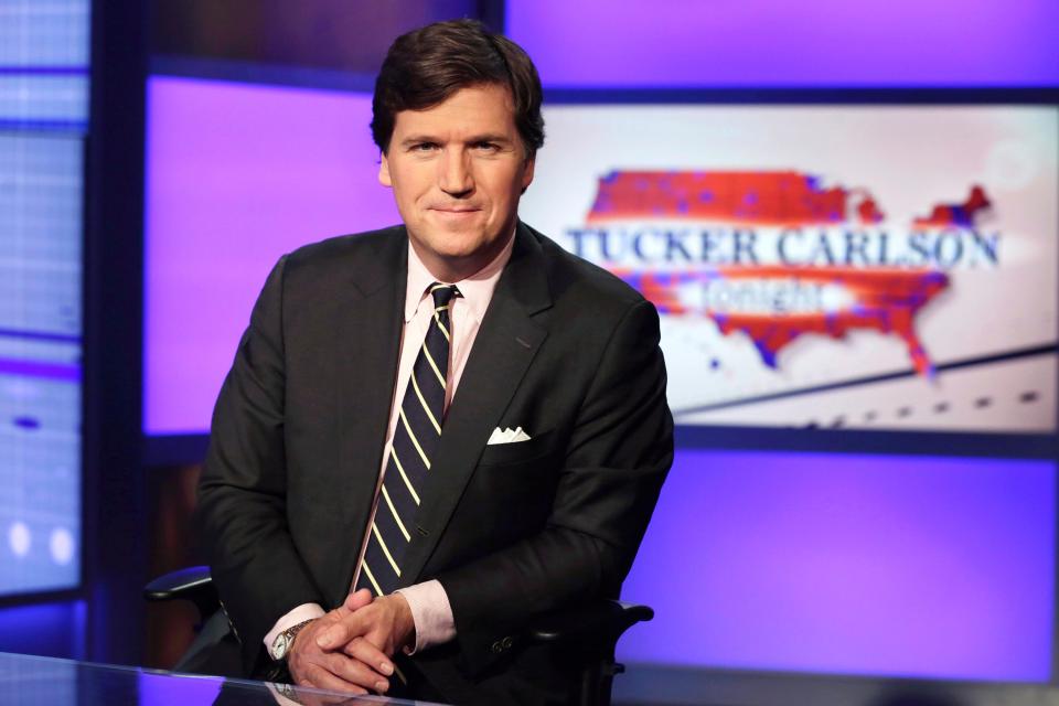 Tucker Carlson, host of "Tucker Carlson Tonight," poses for photos in a Fox News Channel studio on March 2, 2017, in New York.