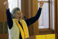 Becky Elder, who helped found the Northfield School of the Liberal Arts in Wichita, Kansas, speaks to a rally for school "choice" proposals with conservative GOP legislators pushing to give tax dollars to parents so that they can use the money to cover private and home schooling costs, Wednesday, Jan. 25, 2023, at the Statehouse in Topeka, Kan.. Years of pandemic restrictions and curriculum battles have emboldened a push from Republican lawmakers and school choice advocates to funnel public funds to private and religious schools in at least a dozen statehouses. (AP Photo/John Hanna)