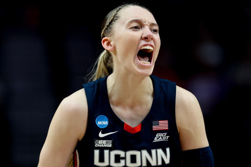 UConn star Paige Bueckers, who was National Player of the Year in 2021, has come back from a torn ACL to lead the Huskies to another Final Four and will face Iowa superstar Caitlin Clark in the NCAA semifinals Friday night.