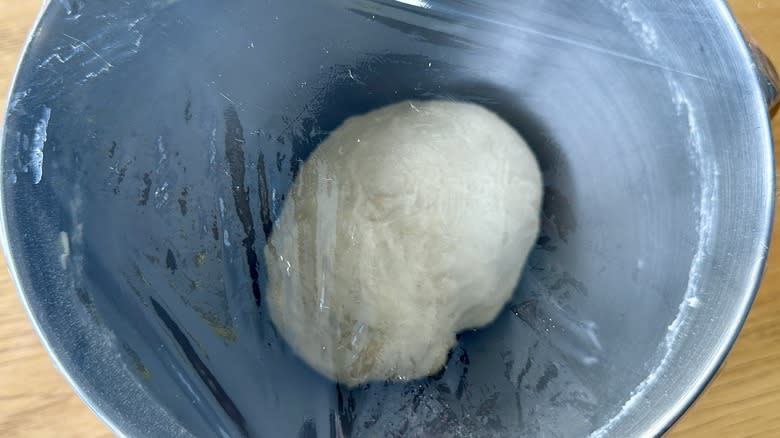 Covered dough in bowl