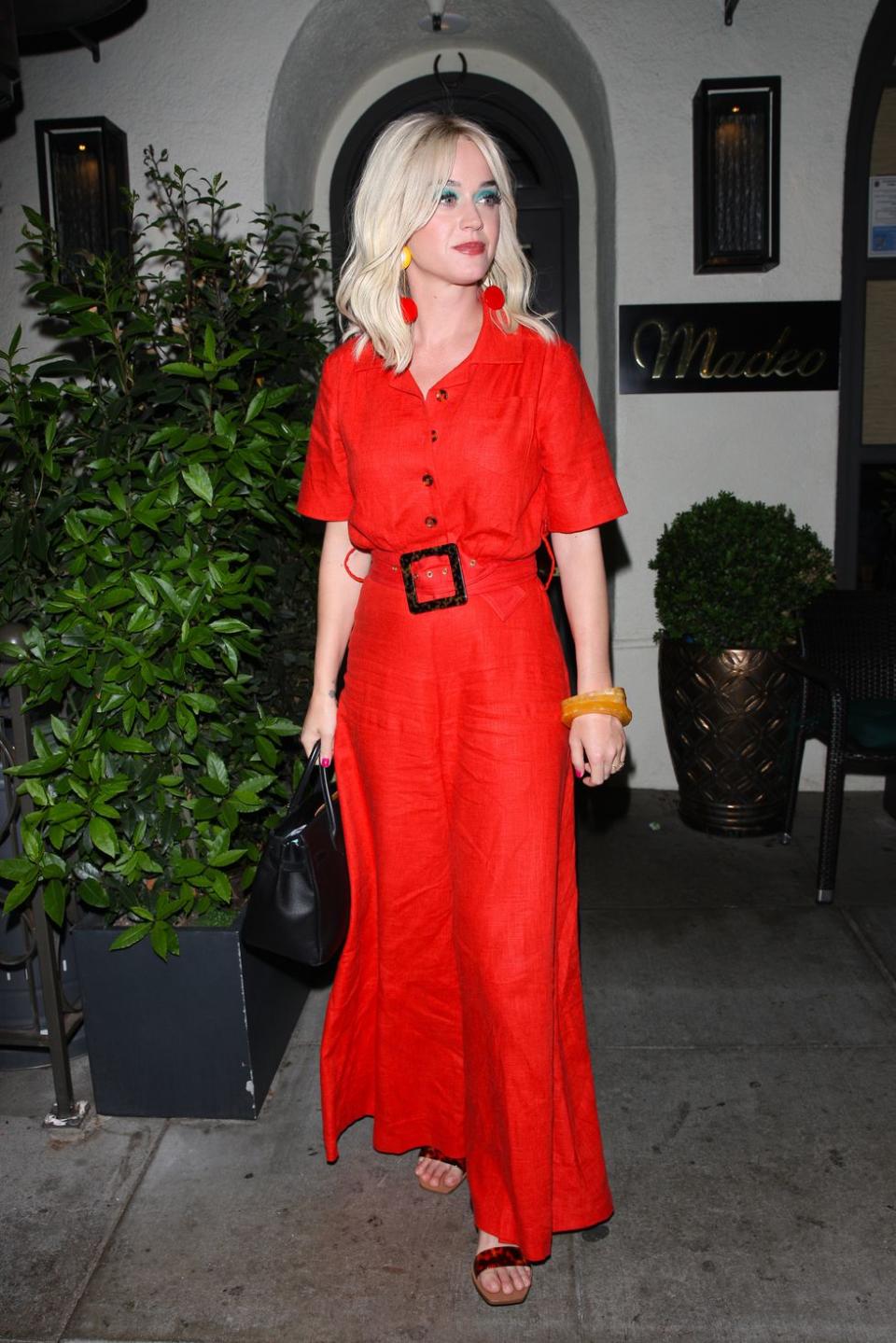 Katy Perry Went on a Date With Orlando Bloom in an Orange Jumpsuit and Neon Blue Eyeshadow