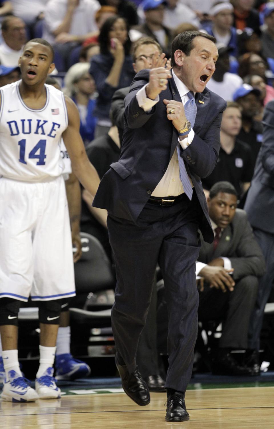 Duke head coach Mike Krzyzewski reacts to a call at the end of the first half of a quarterfinal NCAA college basketball game against Clemson at the Atlantic Coast Conference tournament in Greensboro, N.C., Friday, March 14, 2014. (AP Photo/Bob Leverone)