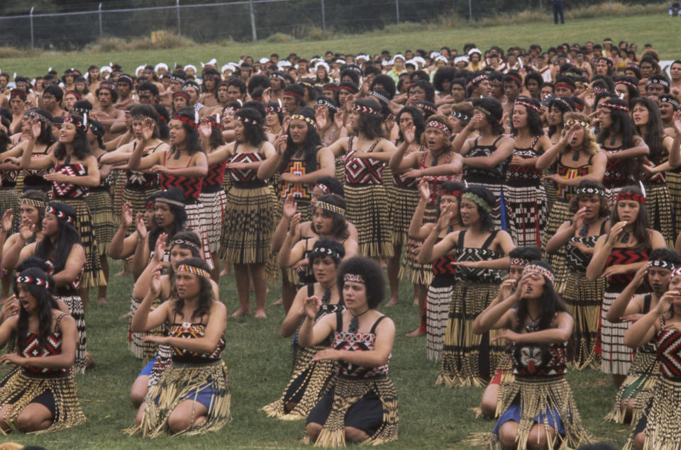 Maori tribespeople welcome Queen Elizabeth ll during her Silver Jubilee visit to New Zealand. (Getty)
