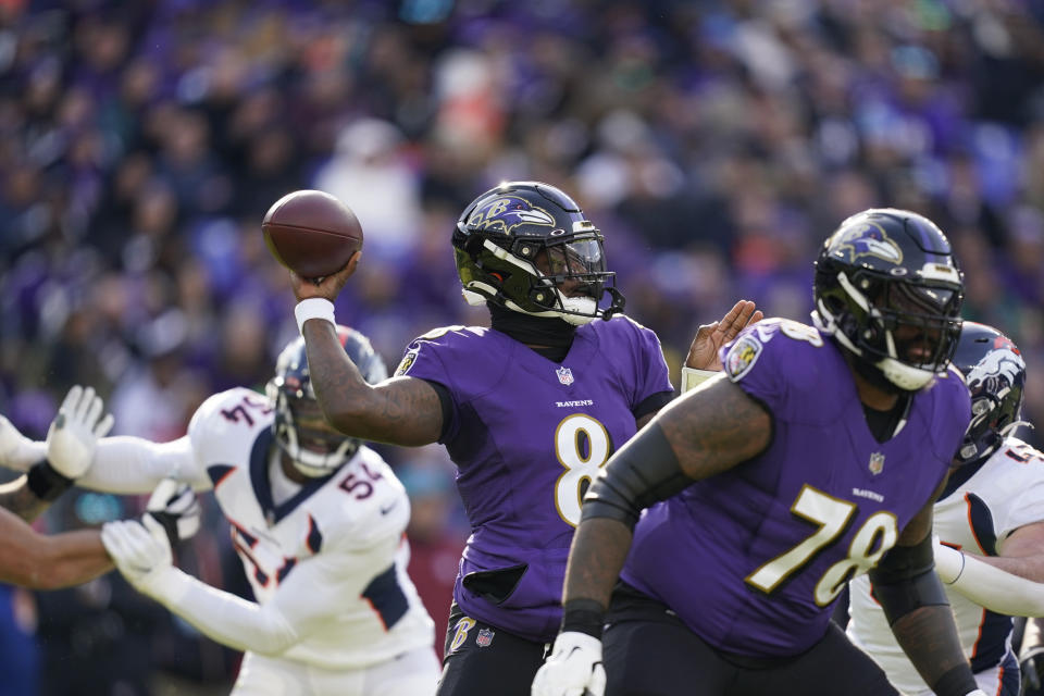 Baltimore Ravens quarterback Lamar Jackson (8) looks to pass in the first half of an NFL football game against the Denver Broncos, Sunday, Dec. 4, 2022, in Baltimore. (AP Photo/Patrick Semansky)