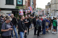 <p>WINDSOR, ENGLAND - SEPTEMBER 08: Members of the public gather on the streets on September 08, 2022 in Windsor, England. Elizabeth Alexandra Mary Windsor was born in Bruton Street, Mayfair, London on 21 April 1926. She married Prince Philip in 1947 and acceded the throne of the United Kingdom and Commonwealth on 6 February 1952 after the death of her Father, King George VI.Queen Elizabeth II died at Balmoral Castle in Scotland on September 8, 2022, and is survived by her four children, Charles, Prince of Wales, Anne, Princess Royal, Andrew, Duke Of York and Edward, Duke of Wessex. (Photo by Chris Jackson/Getty Images)</p> 