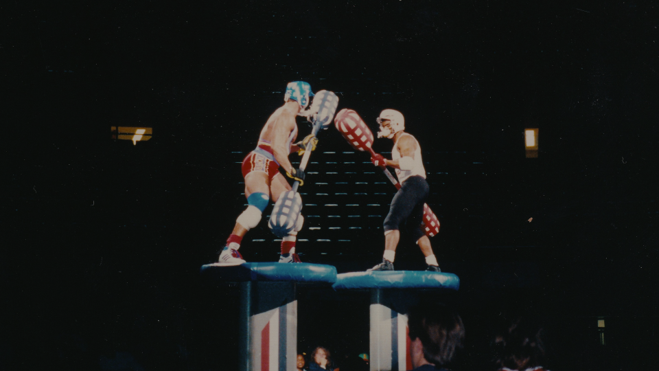 <em>Muscles and Mayhem</em> looks back at the dangerous games of <em>American Gladiators</em>. (Photo: Netflix)