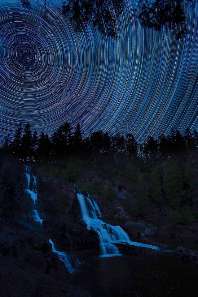 Romaine Bayless has a passion for photography and has recently enjoyed night photography. Pictured is the star trails over Middle Falls in Gooseberry Falls State Park in Minnesota.