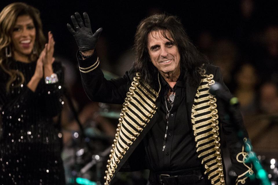 Alice Cooper waves to the crowd during the 17th annual Alice Cooper's Christmas Pudding concert on Saturday, Dec. 8, 2018, at Celebrity Theatre in Phoenix.