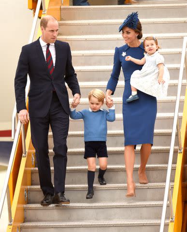 <p>Don MacKinnon/AFP/Getty</p> Prince William, Prince George, Kate Middleton and Princess Charlotte in Canada in 2016.