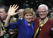 Scottish First Minister Nicola Sturgeon waves at the SEC Centre in Glasgow during the declaration in her constituency in the 2019 general election, Friday Dec. 13, 2019. An exit poll in Britain's election projects that Prime Minister Boris Johnson's Conservative Party likely will win a majority of seats in Parliament. That outcome would allow Johnson to fulfil his plan to take the U.K. out of the European Union next month. (AP Photo/Scott Heppell)