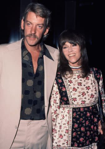 <p>Richard Nairin/Michael Ochs Archives/Getty</p> Donald Sutherland and Jane Fonda in 1972