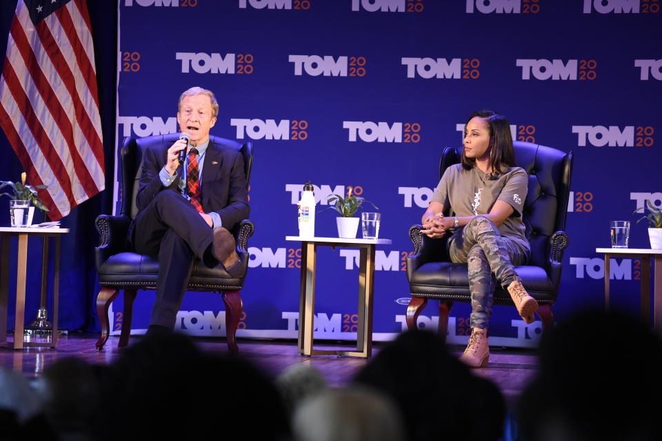 Democratic presidential candidate Tom Steyer, left, next to lyricist MC Lyte, right, speaks at a black women's forum on Tuesday, Dec. 10, 2019, at Allen University in Columbia, S.C. (AP Photo/Meg Kinnard)