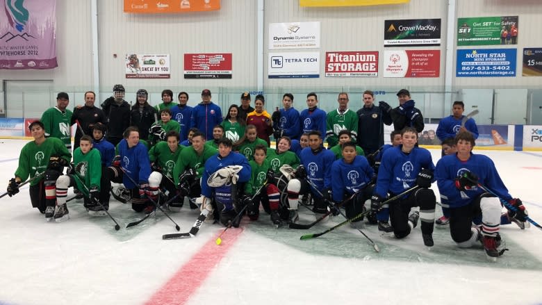 Hockey camp brings Yukon kids from far and wide, to skate with pros