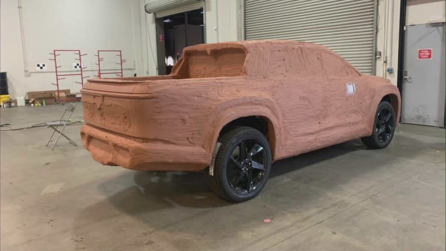 A full-size clay model of a vehicle was left behind along with auto parts, office equipment, trash and possible hazardous materials at Fisker Automotive's former Orange County headquarters. (The United States Bankruptcy Court For The District Of Delaware)