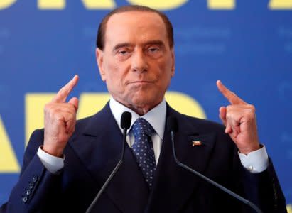 FILE PHOTO: Forza Italia leader Silvio Berlusconi gestures during EPP European People's Party meeting in Fiuggi, Italy, September 17, 2017. REUTERS/Remo Casilli/File Photo