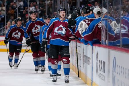 Jan 19, 2019; Denver, CO, USA; Colorado Avalanche center Carl Soderberg (34) celebrates with teammates after his goal in the first period against the Los Angeles Kings at the Pepsi Center. Mandatory Credit: Isaiah J. Downing-USA TODAY Sports