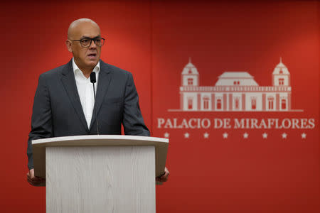 FILE PHOTO: Venezuela's Communications and Information Minister Jorge Rodriguez speaks during a news conference at Miraflores Palace in Caracas, Venezuela October 17, 2018. REUTERS/Carlos Garcia Rawlins