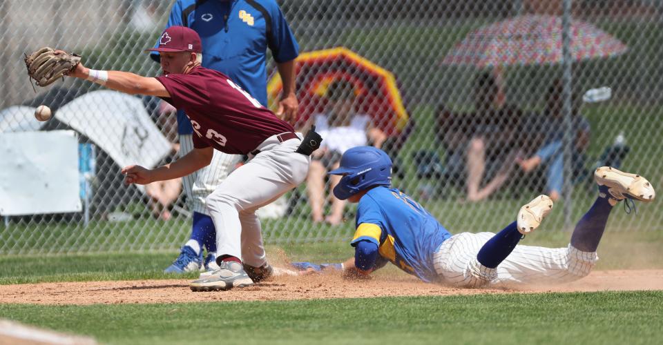 Orem’s Owen Miller (11) slides safely into third ahead of the throw to Maple Mountain’s Sawyer Leifson (13) during a 5A baseball super regional series in Orem on Friday, May 19, 2023. | Jeffrey D. Allred, Deseret News