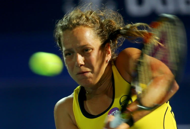 Czech player Barbora Strycova returns the ball to Serbia's Ana Ivanovic during their quarter-final WTA game as part of the Dubai Duty Free Tennis Championships, on February 18, 2016