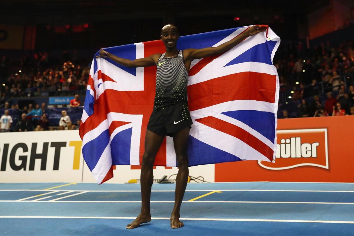 Farah celebrates victory: Getty Images