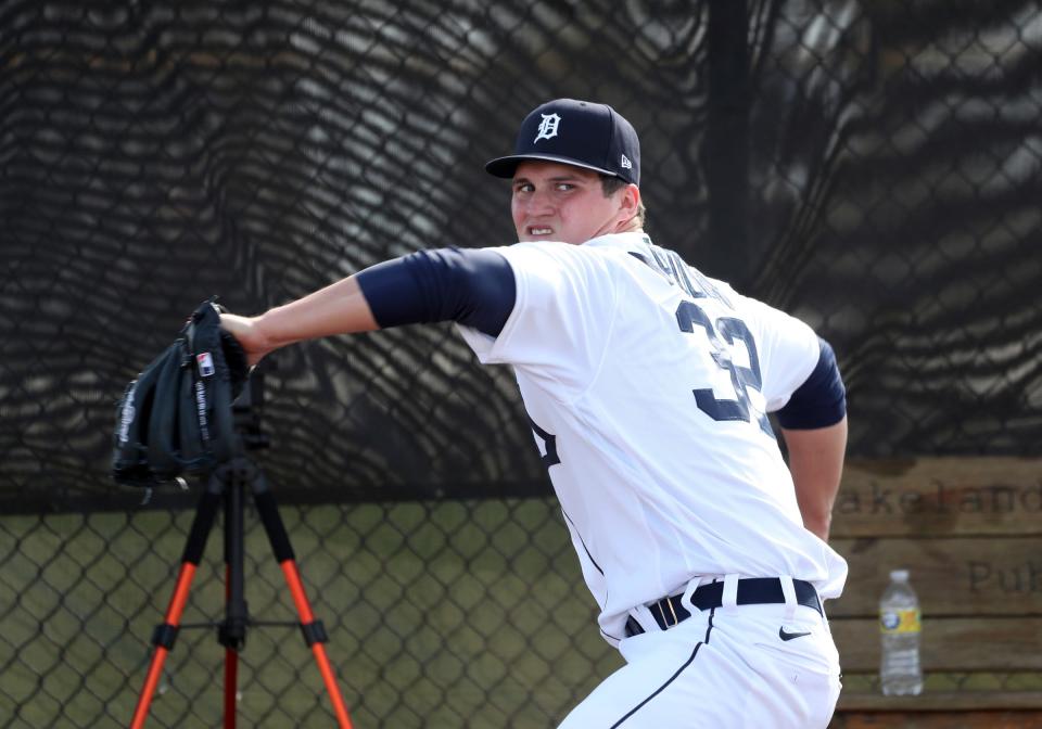 Detroit Tigers pitching prospect Ty Madden warms up before throwing live batting practice during spring training Minor League minicamp Wednesday, Feb. 23, 2022 at Tiger Town in Lakeland.