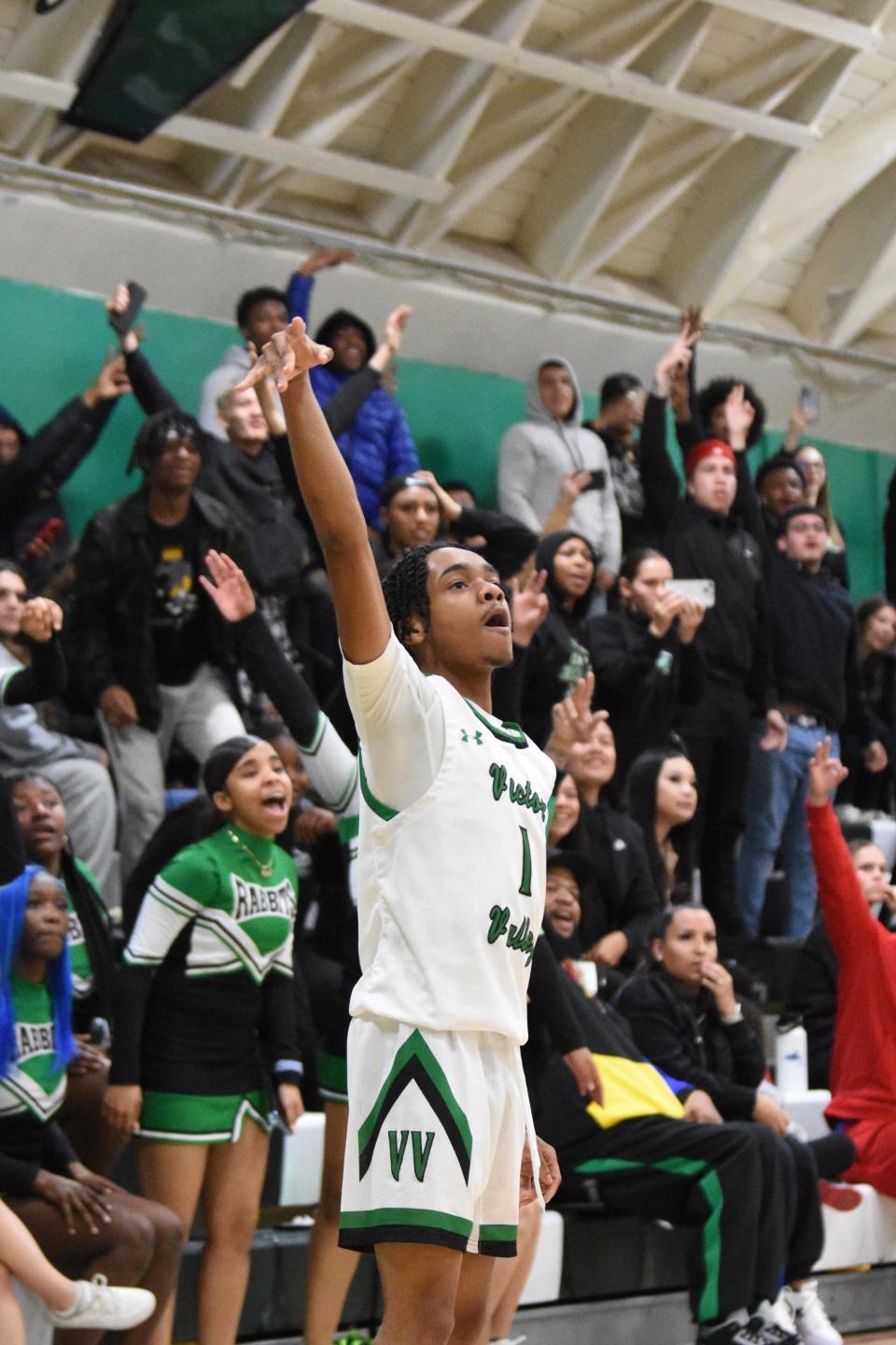Victor Valley’s Isaiah Butler scores the game winning three-pointer late in the fourth quarter against Granite Hills on Thursday, Jan. 25, 2024. Victor Valley defeated Granite Hills 64-61.