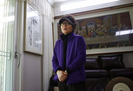 Im Young-ae, whose husband is one of the convicted crew members of the sunken ferry Sewol, speaks during an interview with Reuters at her home in Jindo November 18, 2014. REUTERS/Kim Hong-Ji