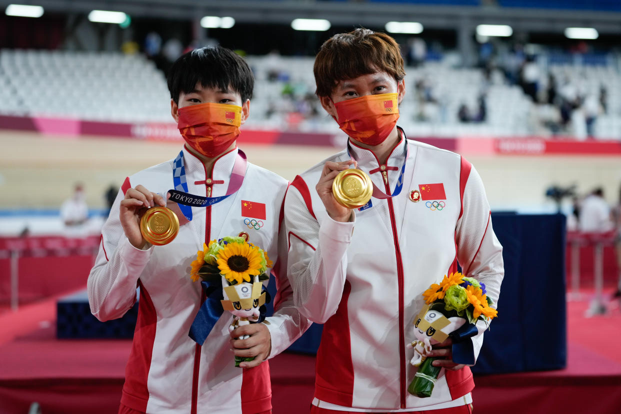 Chinese track cyclists Zhong Tianshi and Bao Shanju are under investigation for allegedly wearing Mao Zedong pins during a medal ceremony. (Photo by Wei Zheng/CHINASPORTS/VCG via Getty Images)