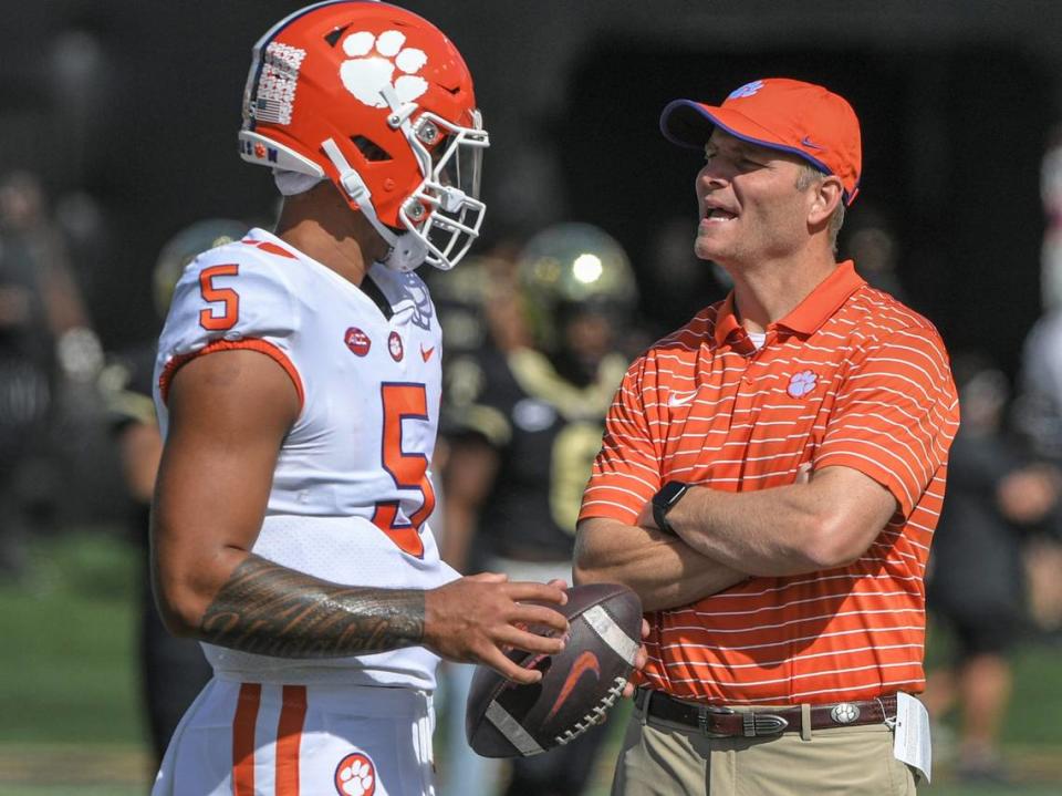 Clemson quarterback D.J. Uiagalelei (5) talks with offensive coordinator Brandon Streeter before he wams up before the game with Wake Forest at Truist Field in Winston-Salem, North Carolina Saturday, September 24, 2022. Ncaa Football Clemson At Wake Forest