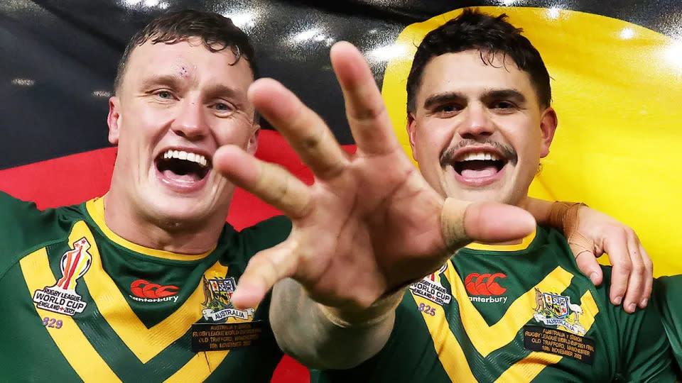 Jack Wighton and Latrell Mitchell pose with the Aboriginal flag at the Rugby League World Cup. (Photo by George Wood/Getty Images)
