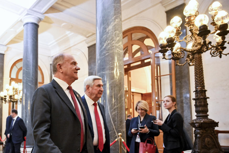 Russian Communist leader Gennady Zyuganov, left, and deputy chairman of the Communist party Ivan Melnikov arrive for Russia's president-elect Vladimir Putin inauguration ceremony in the Grand Kremlin Palace in Moscow, Russia, Tuesday, May 7, 2024. (Alexander Nemenov/Pool Photo via AP)