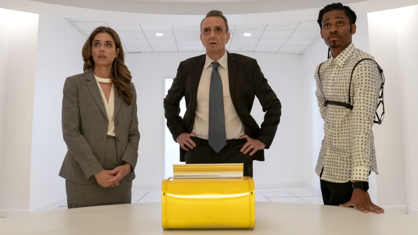 Amanda Peet, left, Hank Azaria and Tyrel Jackson Williams in "Brockmire" on IFC.