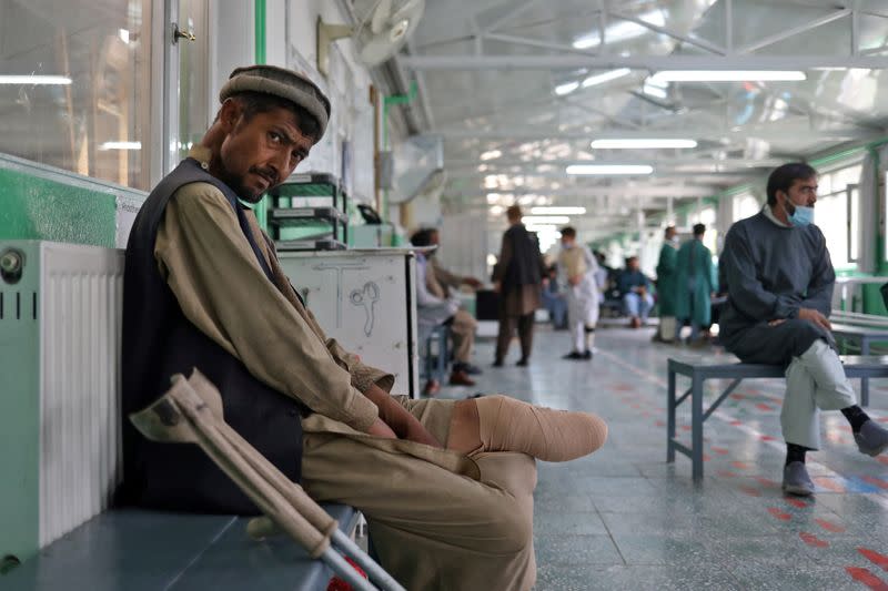 Amanullah sits at the Red Cross rehabilitation center in Kabul