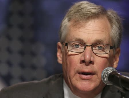 Caterpillar CEO Doug Oberhelman speaks on a panel at the SelectUSA Investment Summit in Washington, DC, U.S. on November 1, 2013. REUTERS/Gary Cameron/File Photo