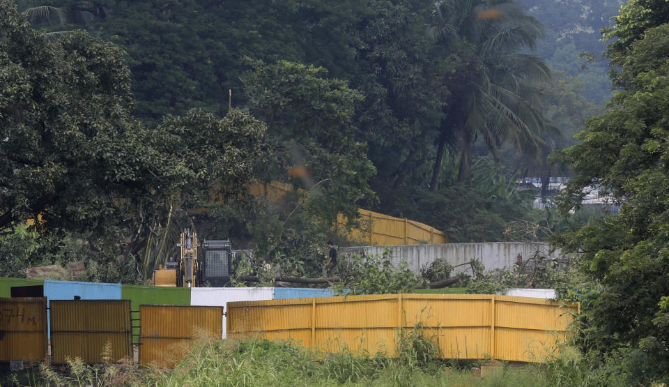 A view of a construction site of a metro train parking shed at Aarey Colony, Mumbai, India, Monday, Oct, 7, 2019. India's Supreme Court has ordered the government of the Indian state of Maharashtra to stop tree-felling after protesters swarmed the area. The court order on Monday stalls tree-cutting at least until another hearing October 21. (AP Photo/Rafiq Maqbool)