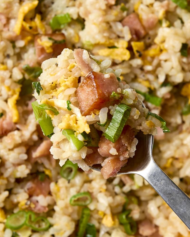 A spoonful of spam fried rice close up.