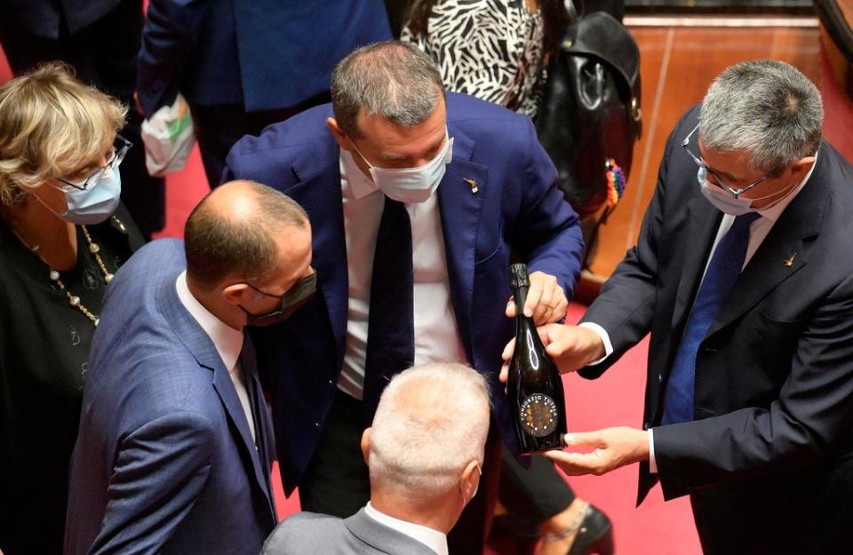 File photo: Italian lawmakers show bottles of Prosecco during a briefing in Rome, Italy, 22 September 2021 (EPA-EFE)