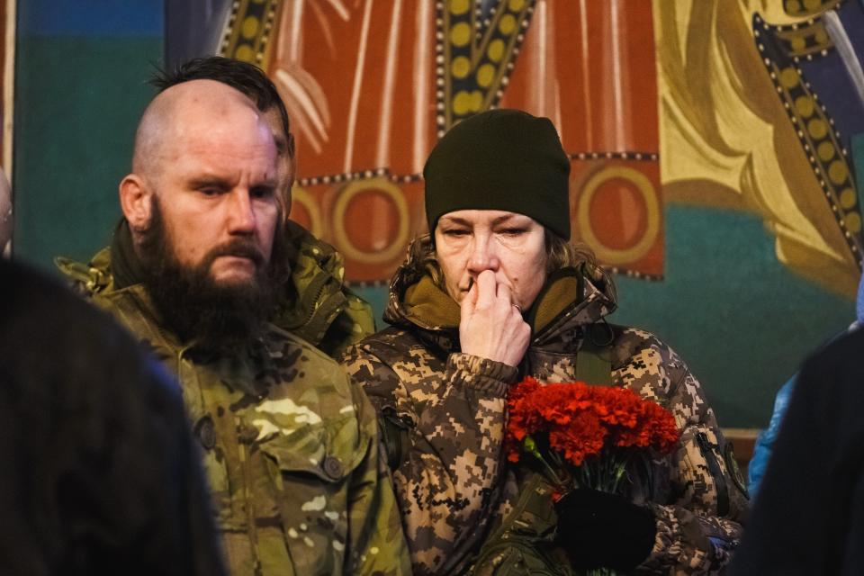 Fellow soldiers mourned the loss of their compatriot (Global Images Ukraine via Getty)