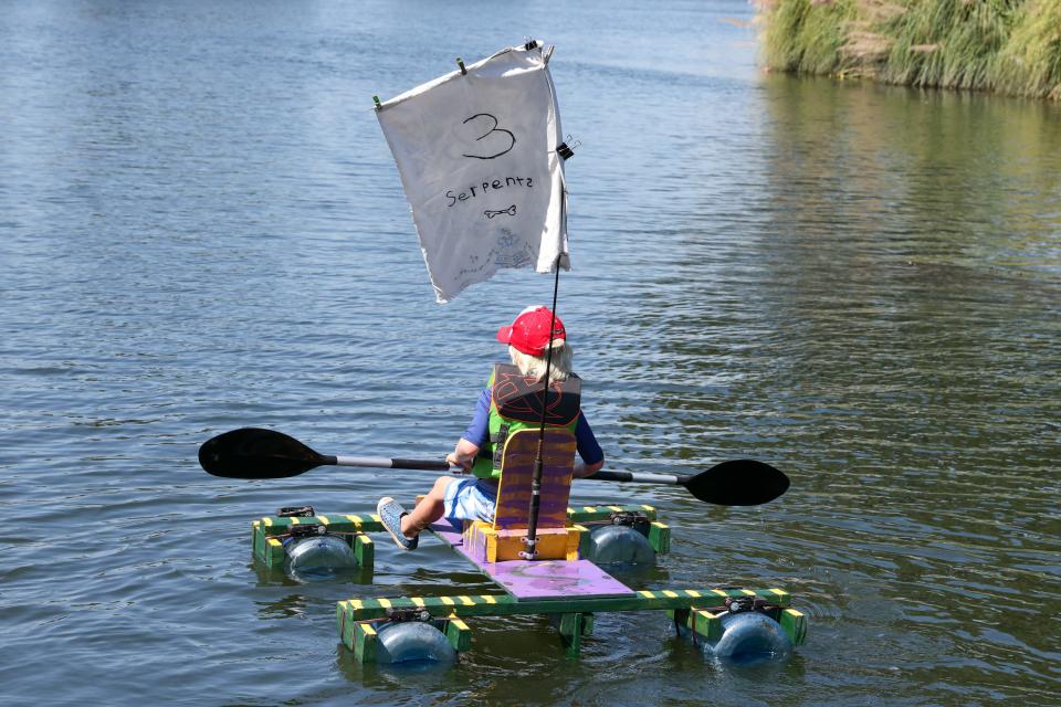 Addison Black takes his ride "3 Serpents" out on the water for a test drive. Addison and his father, Aaron, worked on their boat together in preparation for the 13th Annual Bathtub Boat Race at Louis Park.