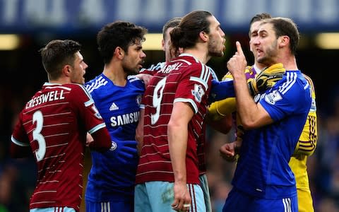 Andy Carroll argues with Branislav Ivanovic  - Credit: Getty images