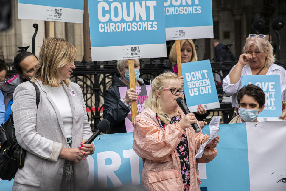 Heidi Crowter, front right, photographed at her High Court appeal, with Don't Screen Us Out, in London. (Supplied)