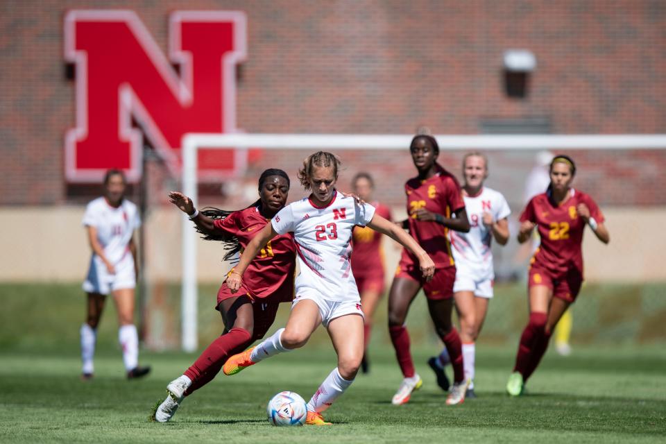 USC (red) battles Nebraska (white) during a women's college soccer match on Sept. 11, 2022.