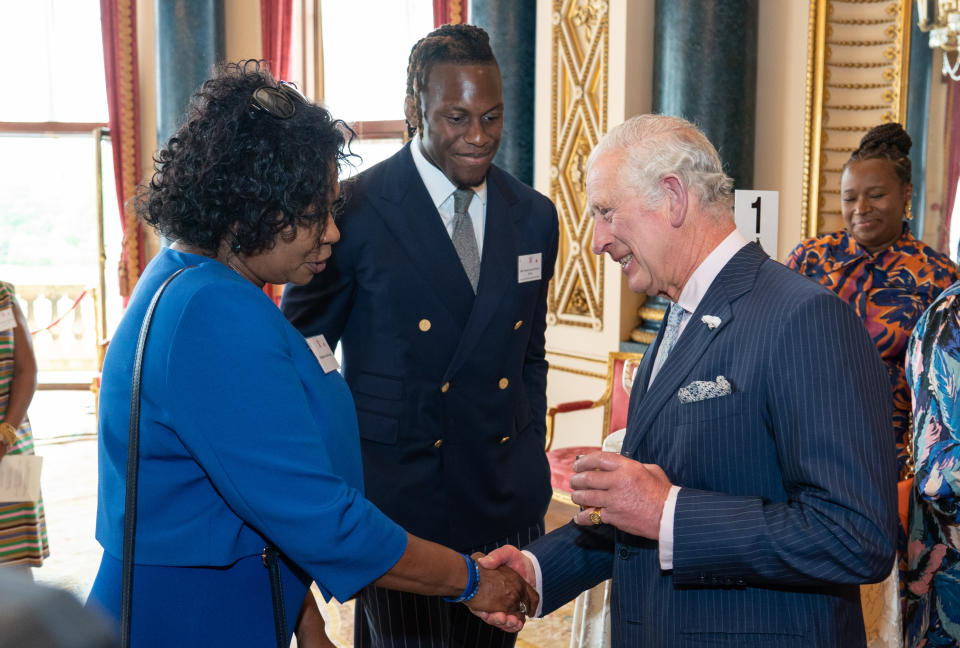 The Prince of Wales meets Brenda Edwards and England rugby player Maro Itoje at a reception at Buckingham Palace in London to celebrate the Commonwealth Diaspora of the United Kingdom ahead of the Commonwealth Heads of Government Meeting in Rwanda. Picture date: Thursday June 9, 2022.