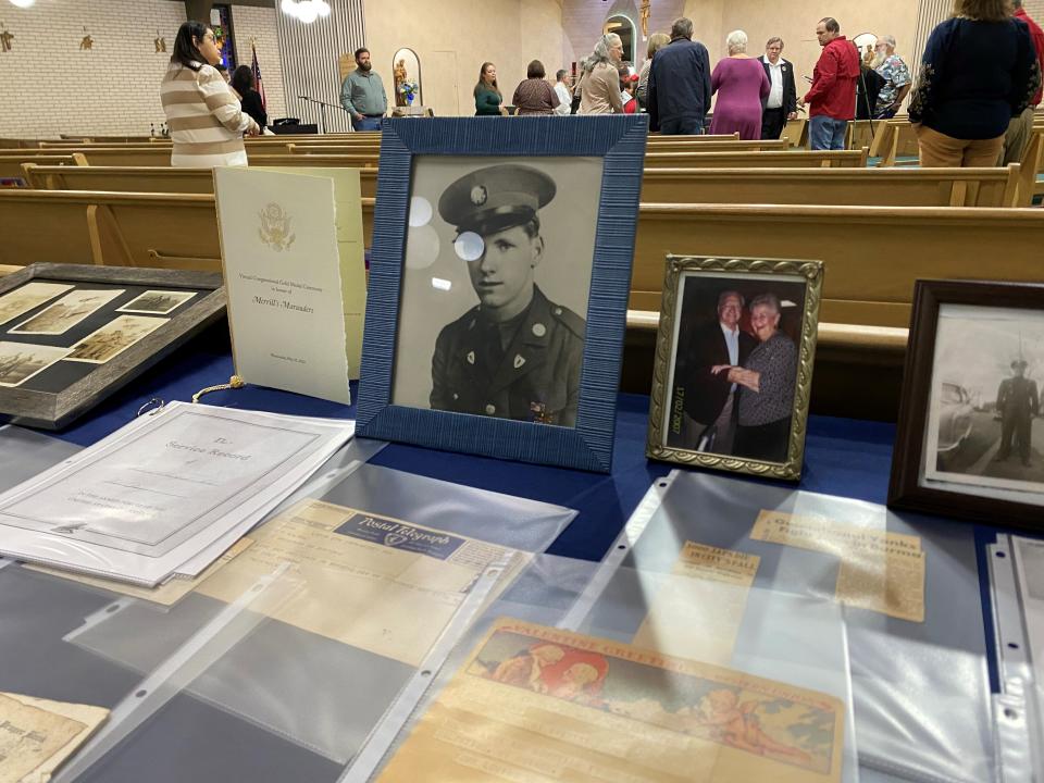 Photos of the late Frederick Nolan, a Merrill's Marauder and World War II veteran from Corpus Christi, are displayed during a ceremony where his family was presented with a Congressional Gold Medal for his service on Friday, Nov. 25, 2022.