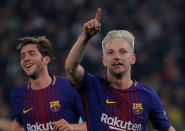 Soccer Football - La Liga Santander - Real Betis vs FC Barcelona - Estadio Benito Villamarin, Seville, Spain - January 21, 2018 Barcelona’s Ivan Rakitic celebrates scoring their first goal with Sergi Roberto REUTERS/Jon Nazca